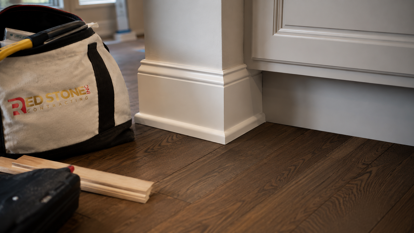 Detail of new hardwood, trim and cabinetry finishes completed in a home renovation Etobicoke property